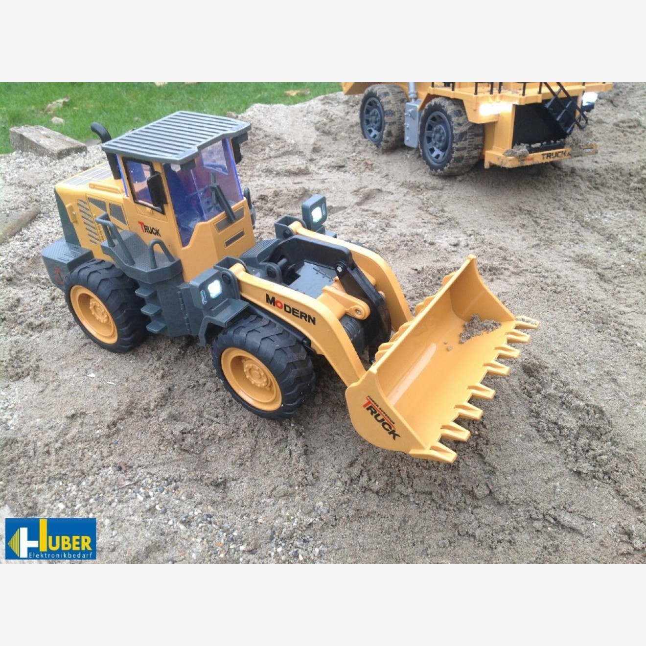 Radlader Bulldozer ferngesteuert mit Licht & Sound und vieles mehr! Radlader Bulldozer ferngesteuert mit Licht & Sound und vieles mehr!